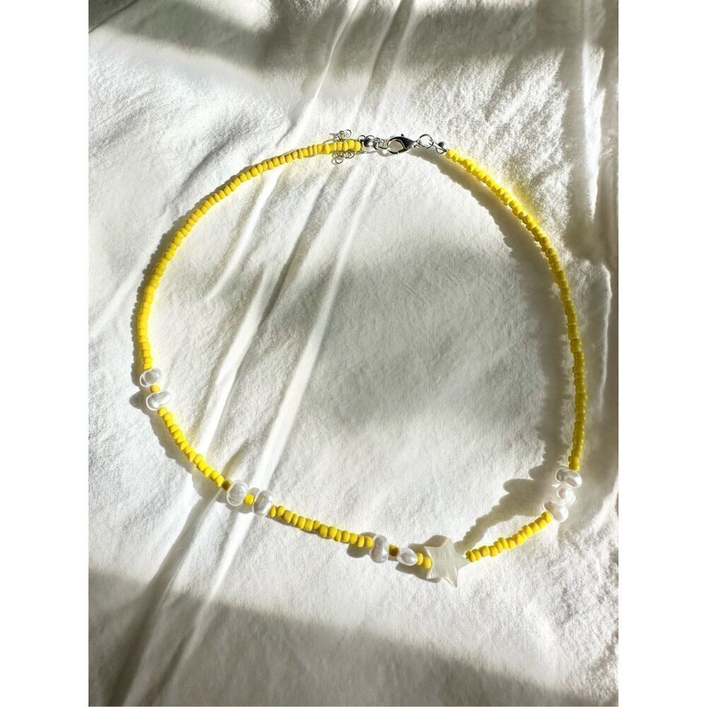 Yellow beaded star sea shell and pearl beach necklace